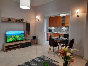 A kitchen or kitchenette at Pavlos Apartment