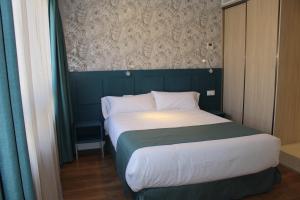 Postel nebo postele na pokoji v ubytování Modo Hotel Apartamento