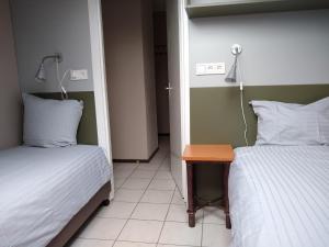 Postel nebo postele na pokoji v ubytování Boszicht 4 appartement in Oostkapelle