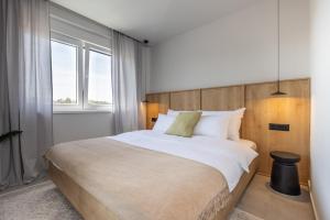 Ένα ή περισσότερα κρεβάτια σε δωμάτιο στο Villa Amari +22 φωτογραφίες