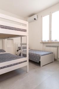Postel nebo postele na pokoji v ubytování Bed&Biker