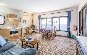 a living room with a couch and a table at Costa Nova in Jávea