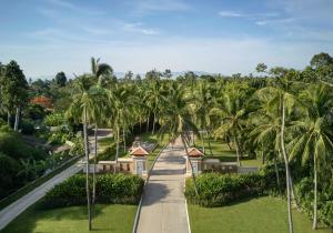 an aerial view of a resort with palm trees at Santiburi Koh Samui in Mae Nam