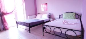 Postel nebo postele na pokoji v ubytování Holiday & Business Furnished Apartments