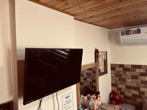 TV a/nebo společenská místnost v ubytování IBN Khaldoon