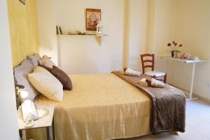 Postel nebo postele na pokoji v ubytování vacanza Taormina mare