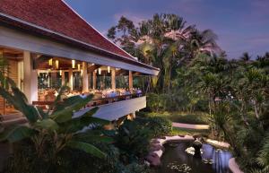 a resort with a pool and a restaurant at Santiburi Koh Samui in Mae Nam