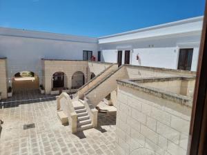 a view of a building with a staircase and a stair case at MARE NOSTRUM in Fasano