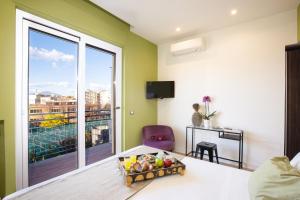 A bed or beds in a room at SorrentoVibes - Amazing Home with terrace & view Sorrento Center