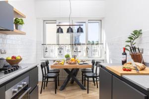 A kitchen or kitchenette at SorrentoVibes - Amazing Home with terrace & view Sorrento Center