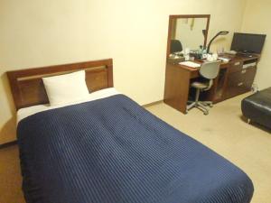 Postelja oz. postelje v sobi nastanitve HOTEL LiVEMAX BUDGET Nagoya