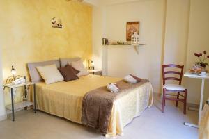 Postel nebo postele na pokoji v ubytování vacanza Taormina mare