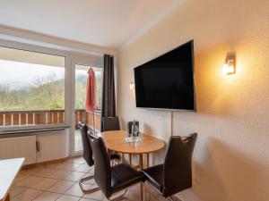 TV a/nebo společenská místnost v ubytování Apartment Holiday-1 by Interhome + 29 fotografií