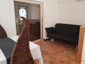 Posedenie v ubytovaní Giasone Apartments