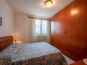 Кровать или кровати в номере Apartment Germana by Interhome
