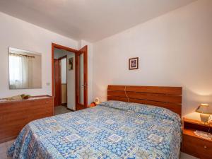 Säng eller sängar i ett rum på Apartment Germana by Interhome