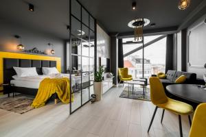 Posteľ alebo postele v izbe v ubytovaní Q18 ApartHotel