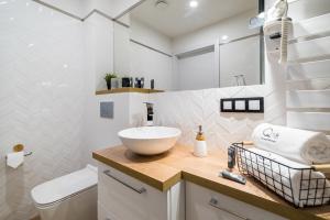 Kúpeľňa v ubytovaní Q18 ApartHotel