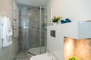 Kúpeľňa v ubytovaní Q18 ApartHotel
