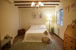 Posteľ alebo postele v izbe v ubytovaní Villa española, Casa del Nene