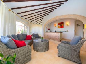 A seating area at Holiday Home La Grippiere by Interhome