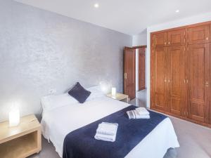 Ein Bett oder Betten in einem Zimmer der Unterkunft Apartment Misefo by Interhome