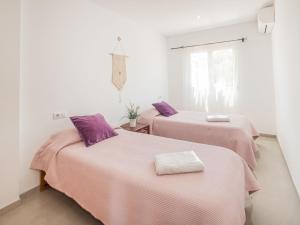 Ein Bett oder Betten in einem Zimmer der Unterkunft Apartment Misefo by Interhome