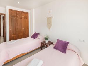 Ein Bett oder Betten in einem Zimmer der Unterkunft Apartment Misefo by Interhome