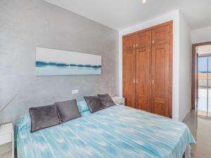 Ein Bett oder Betten in einem Zimmer der Unterkunft Apartment Misefo by Interhome