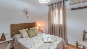 Posteľ alebo postele v izbe v ubytovaní Casa Los Baenas Casabermeja by Ruralidays