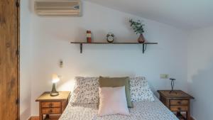 Posteľ alebo postele v izbe v ubytovaní Casa Los Baenas Casabermeja by Ruralidays
