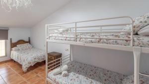 Posteľ alebo postele v izbe v ubytovaní Casa Los Baenas Casabermeja by Ruralidays