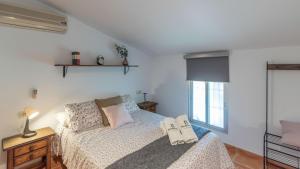 Posteľ alebo postele v izbe v ubytovaní Casa Los Baenas Casabermeja by Ruralidays + 26 fotografií