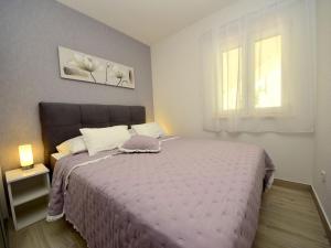 Postel nebo postele na pokoji v ubytování Apartment Villa Andjelka-4 by Interhome