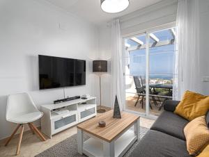 TV a/nebo společenská místnost v ubytování Small Oasis 2366 Sea View