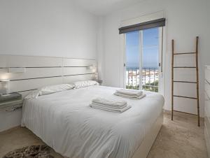 Postel nebo postele na pokoji v ubytování Small Oasis 2366 Sea View