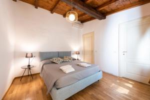 Posteľ alebo postele v izbe v ubytovaní Santa Croce Palace by Mmega