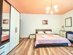 a bedroom with a bed and a tv at Apartment Villa Luka by Interhome in Kruševo