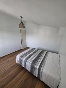 Postel nebo postele na pokoji v ubytování GRANGE DES ORCHIDEES (Avec piscine)