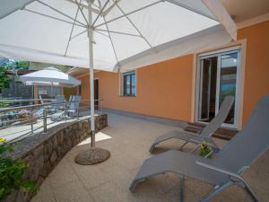 Balkón nebo terasa v ubytování Holiday Home Nikolina by Interhome