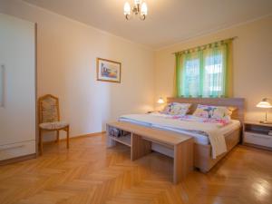 Postel nebo postele na pokoji v ubytování Holiday Home Nikolina by Interhome