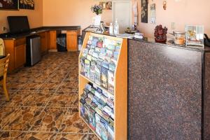 a counter with many cards on it in a room at Route 66 Inn of Santa Rosa, NM in Santa Rosa