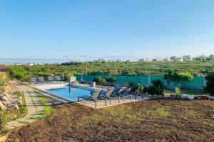 Bazén v ubytovaní appart Libeccio swimming pool bbq alebo v jeho blízkosti