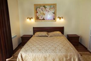 Cama o camas de una habitación en Afina Hotel