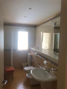 Koupelna v ubytování B&B Il Sogno + 15 fotografií