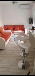 a living room with a sink and a couch at Smart Bijela in Bijela