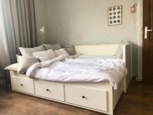 Łóżko lub łóżka w pokoju w obiekcie Apartament Plaża Zachodnia - 400 m do morza