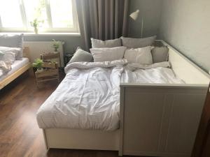 Łóżko lub łóżka w pokoju w obiekcie Apartament Plaża Zachodnia - 400 m do morza