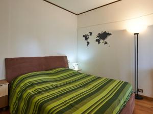 A bed or beds in a room at Apartment Hermitage-19 by Interhome