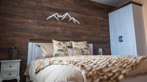 A bed or beds in a room at House Proctor